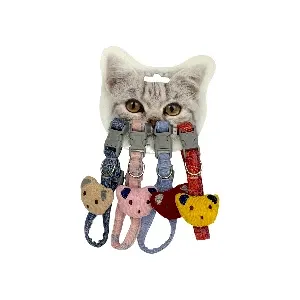 Collier pour chat en tissu avec tête de chat et un anneau en métal pour la laisse
