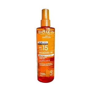 Huile bronzante pour tous types de peaux au beurre de cacao, huile de carotte et la vitamine E, Hydratation 24h, Résistant à l'eau, UVB+ UVA, SPF 15, Bioxcin, 200ml